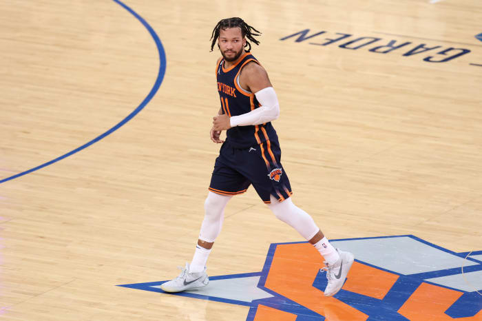 Jalen Brunson runs down the court.